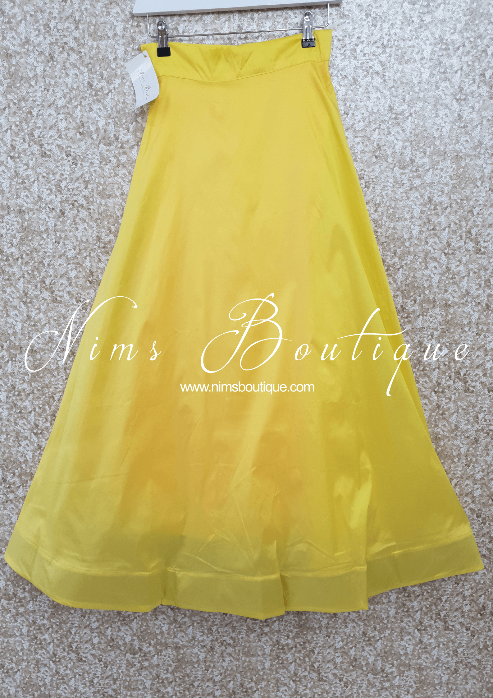 Nims Boutique Light Yellow Plain Semi stitched skirt/lehnga