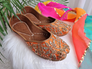 Orange Embellished Leather Punjabi Juttis