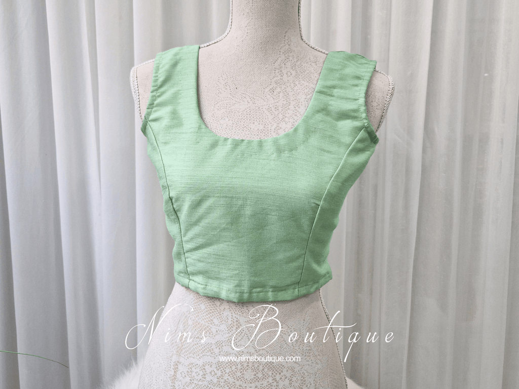 Nims Boutique Sleeveless Mint Blouse 4-18