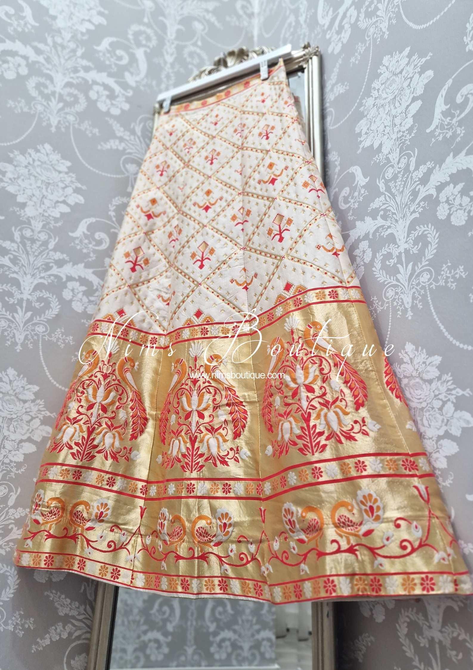 Nims Boutique Ivory, Red & Orange Brocade Semi stitched skirt/lehnga