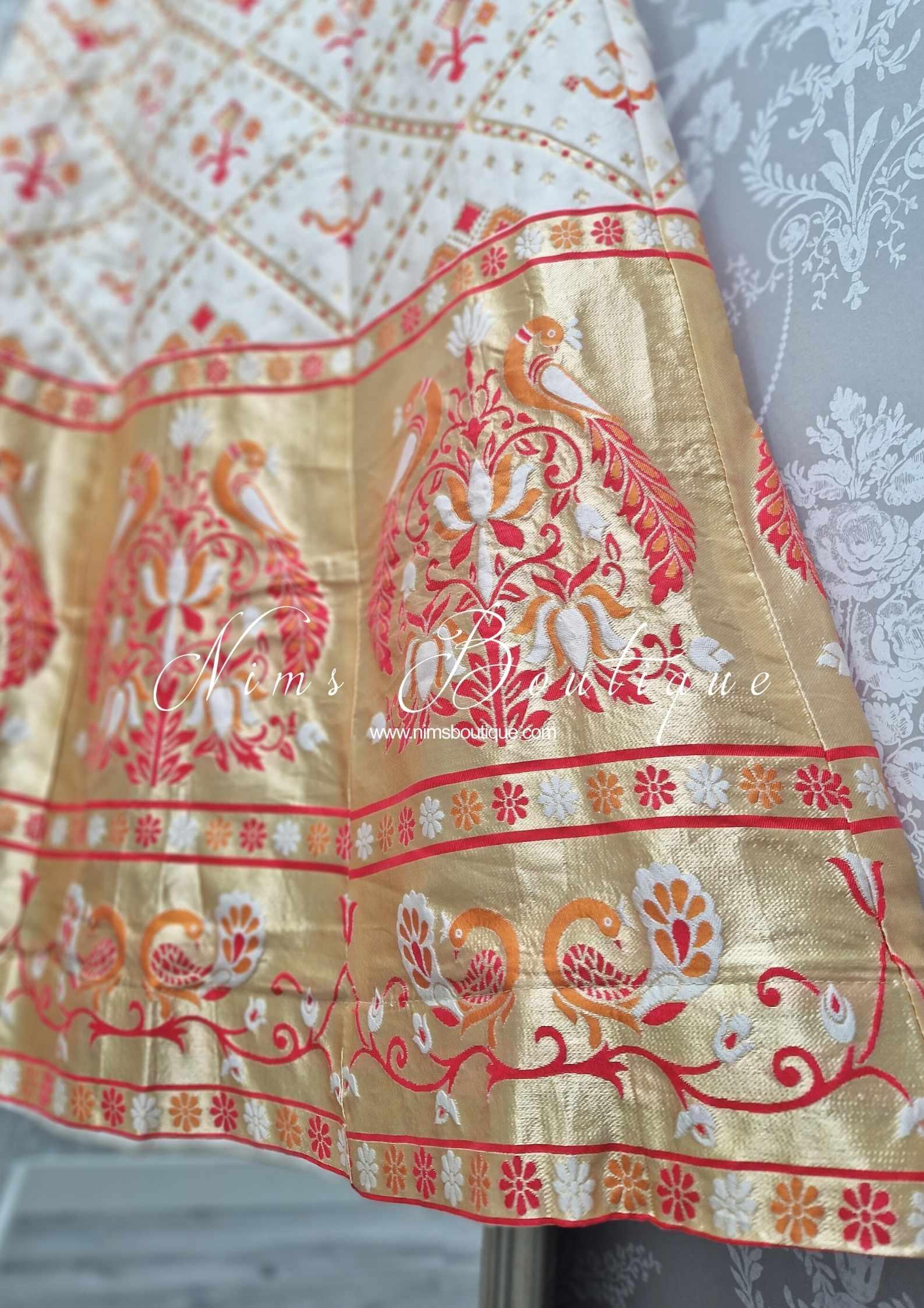 Nims Boutique Ivory, Red & Orange Brocade Semi stitched skirt/lehnga