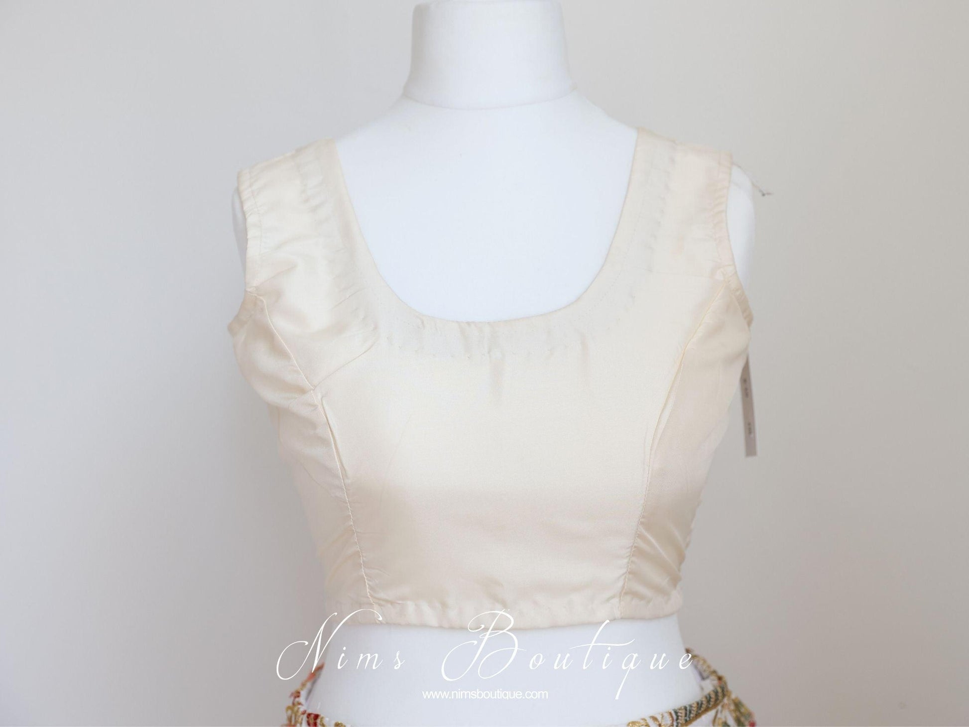 Nims Boutique The NB Cream Sleeveless Silk Blouse 4-24