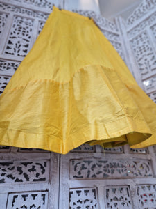 Nims Boutique Yellow Raw Silk Semi stitched skirt/lehnga