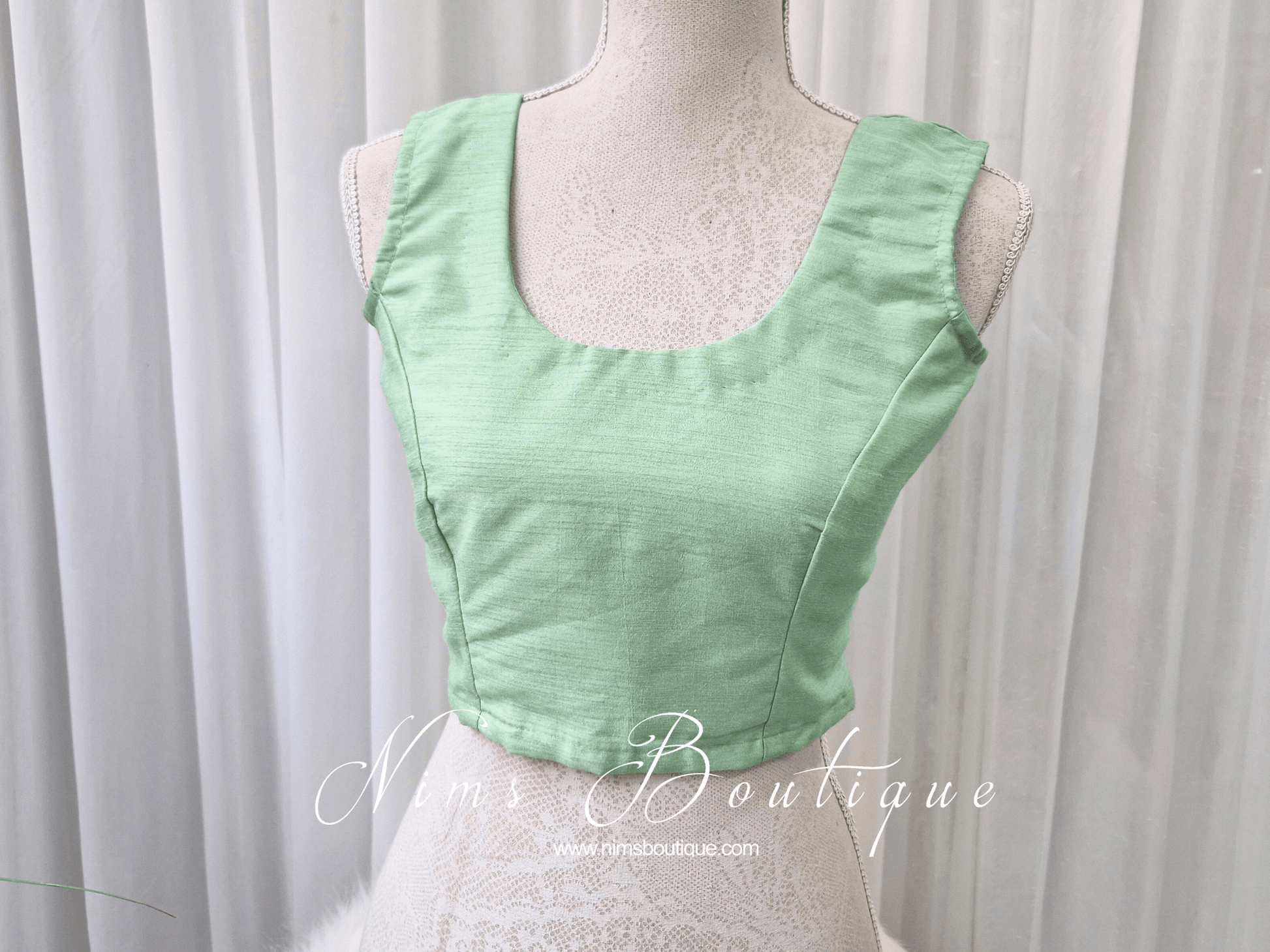 Nims Boutique Sleeveless Mint Blouse 4-18