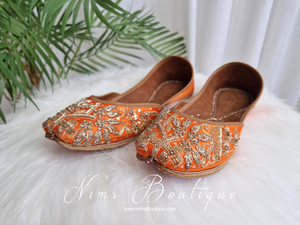 Orange Embellished Leather Punjabi Juttis