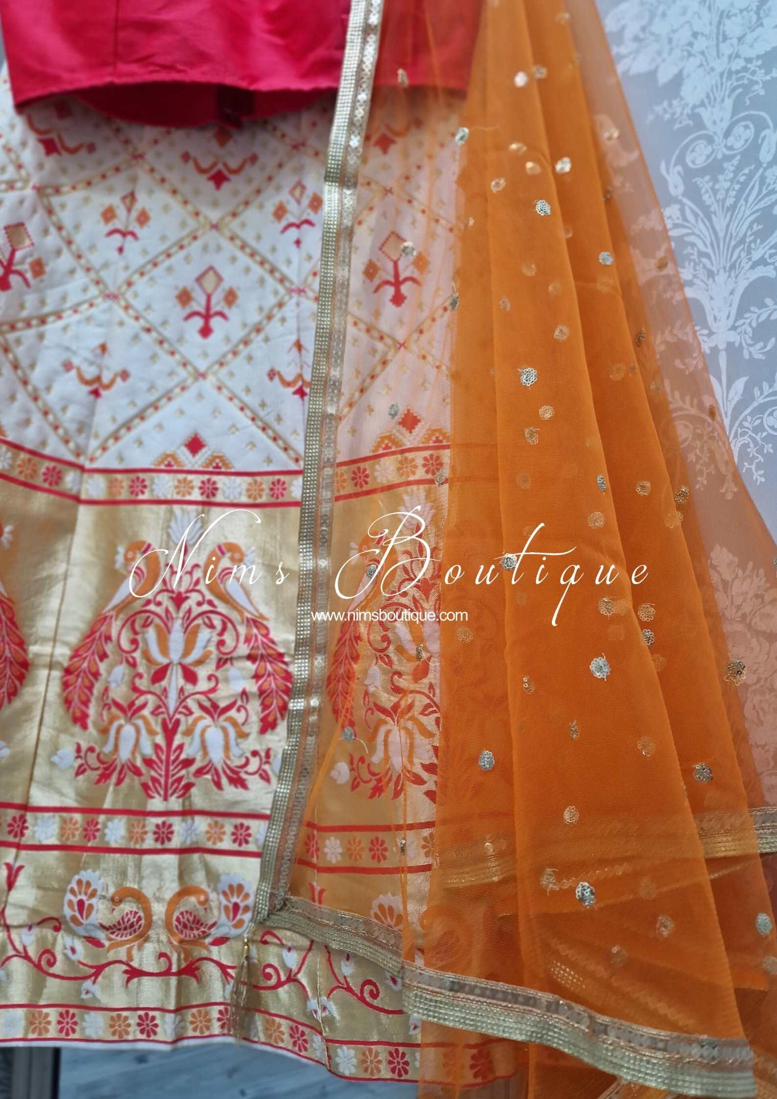 Nims Boutique Ivory, Red & Orange Brocade Semi stitched skirt/lehnga
