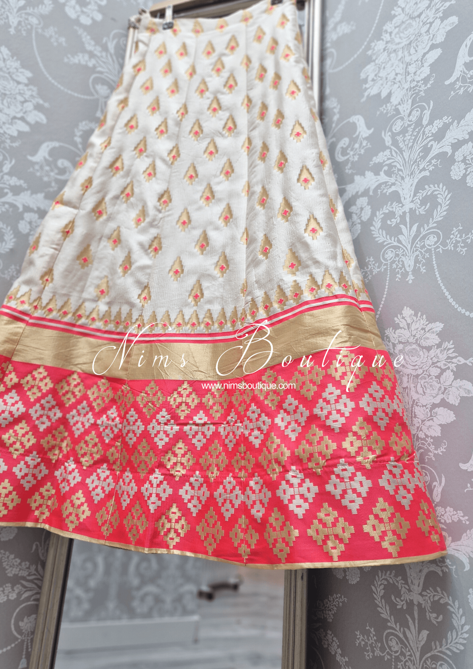 Nims Boutique Ivory & Coral Brocade Semi stitched skirt/lehnga