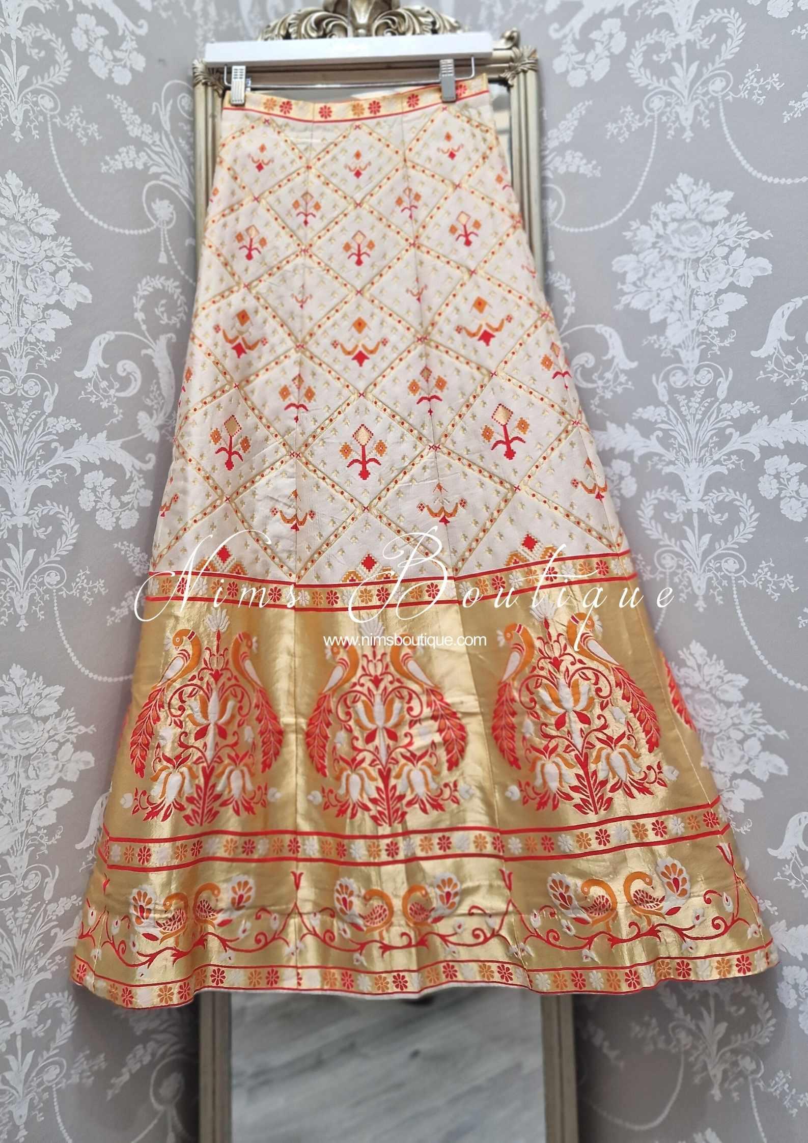 Nims Boutique Ivory, Red & Orange Brocade Semi stitched skirt/lehnga