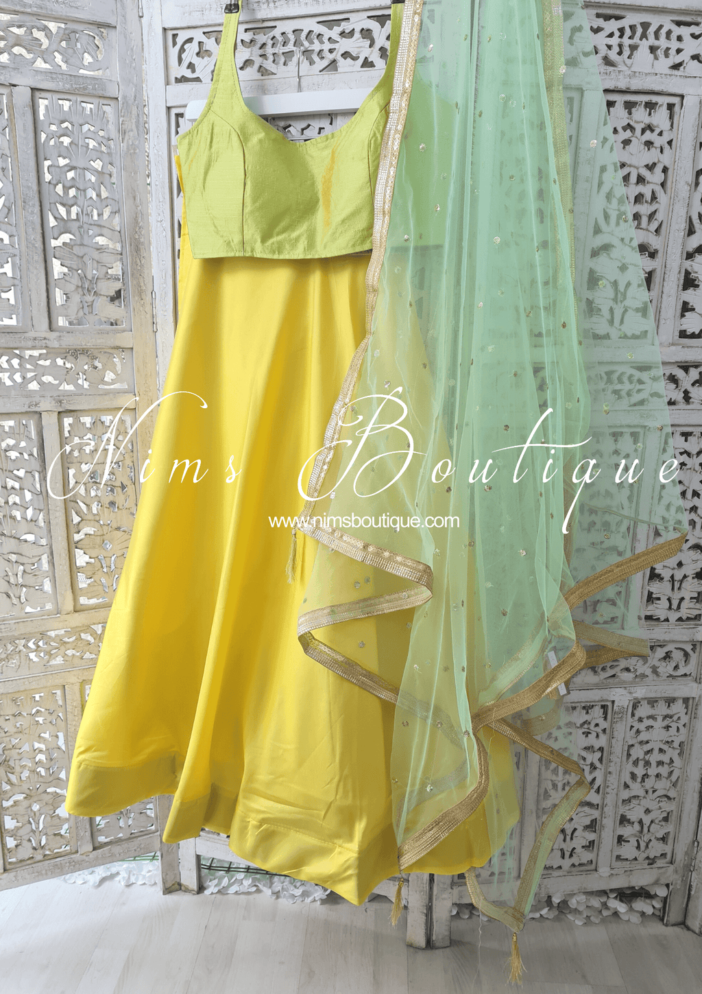 Nims Boutique Light Yellow Plain Semi stitched skirt/lehnga
