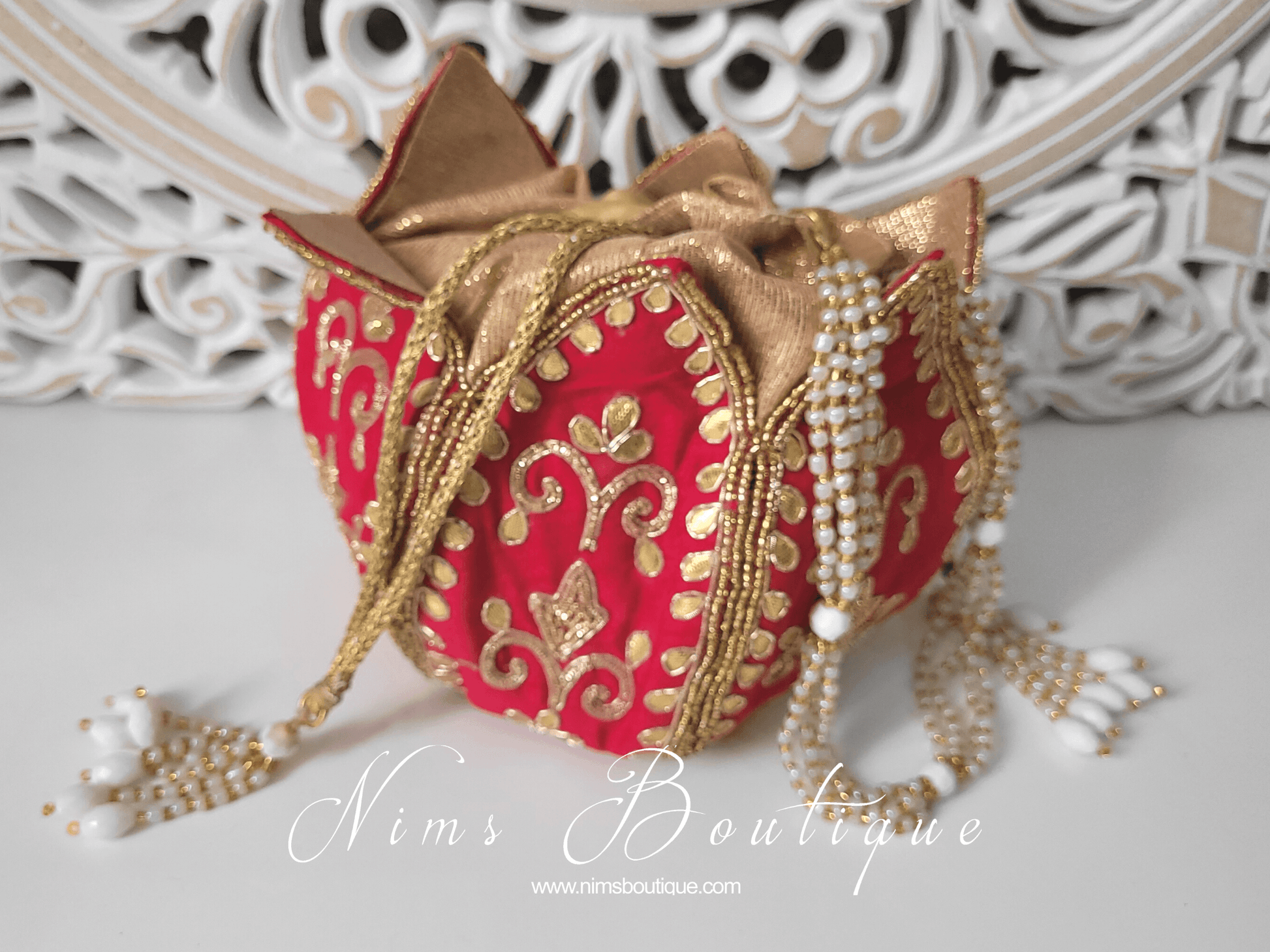 Nims Boutique Bright Red Potli Raw Silk Embellished Bag