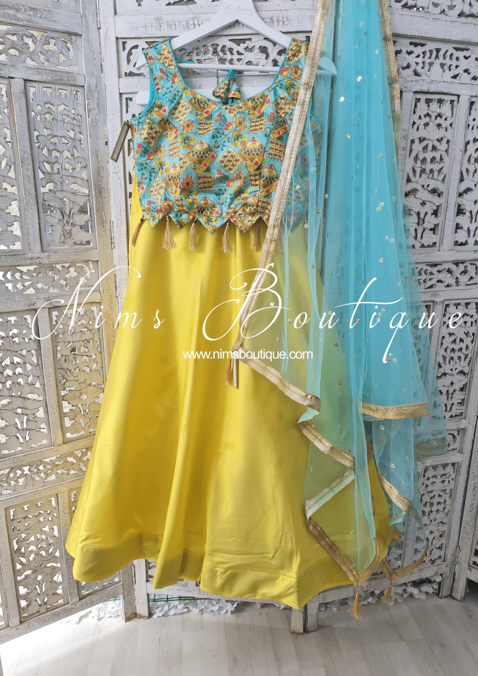Nims Boutique Light Yellow Plain Semi stitched skirt/lehnga
