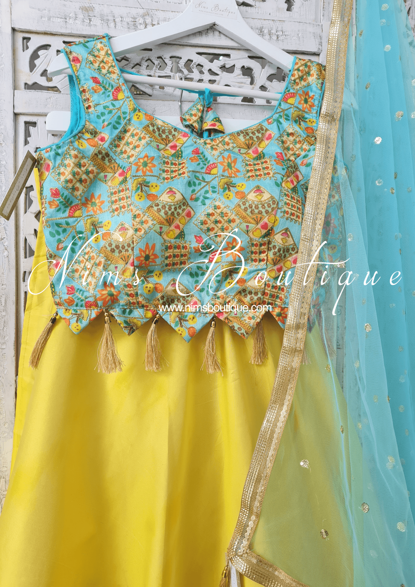 Nims Boutique Light Yellow Plain Semi stitched skirt/lehnga