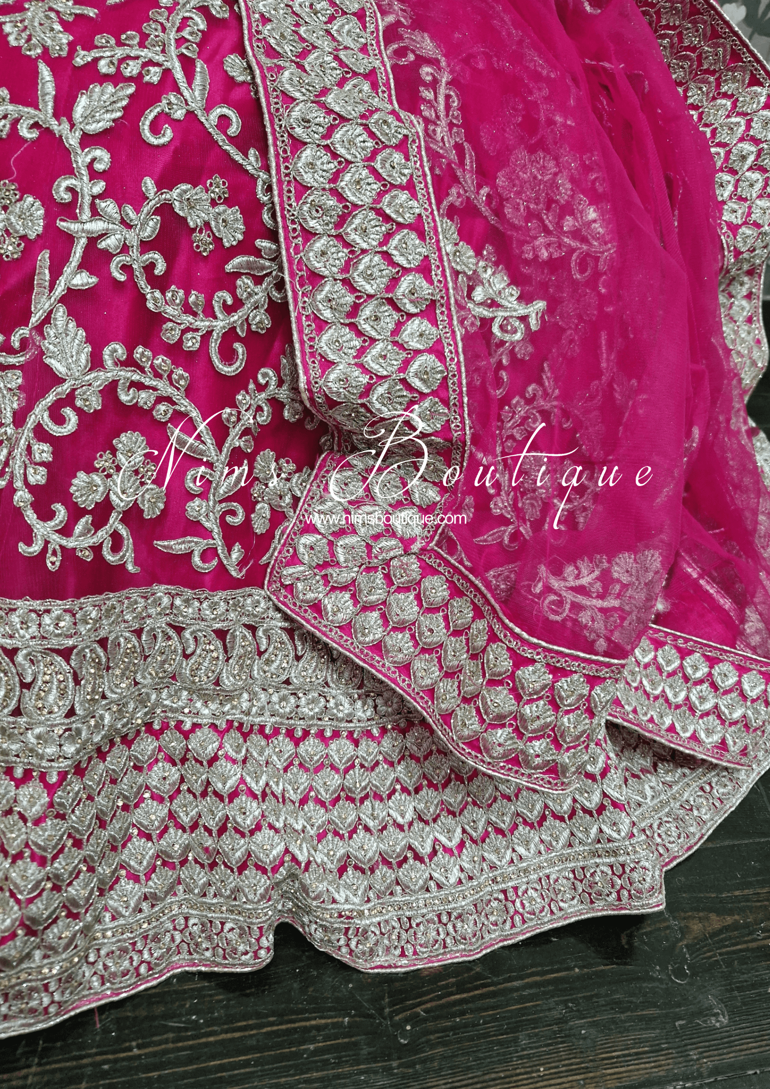 Nims Boutique Luxury Semi Stitched Magenta Embroidered Lehnga