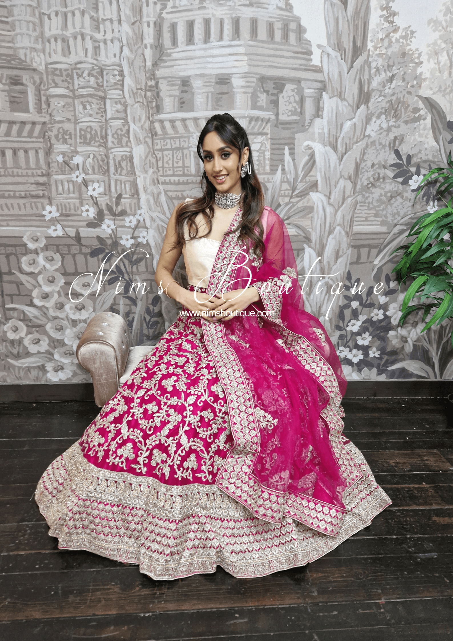 Nims Boutique Luxury Semi Stitched Magenta Embroidered Lehnga