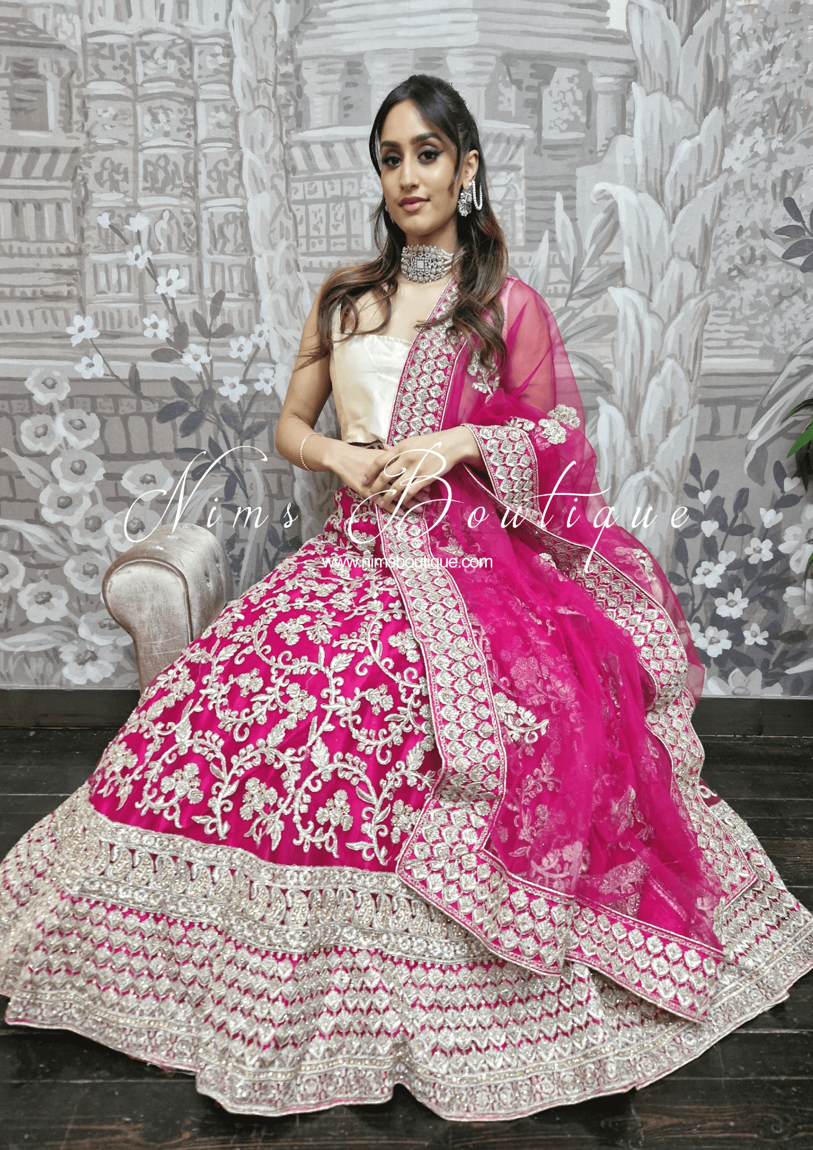 Nims Boutique Luxury Semi Stitched Magenta Embroidered Lehnga