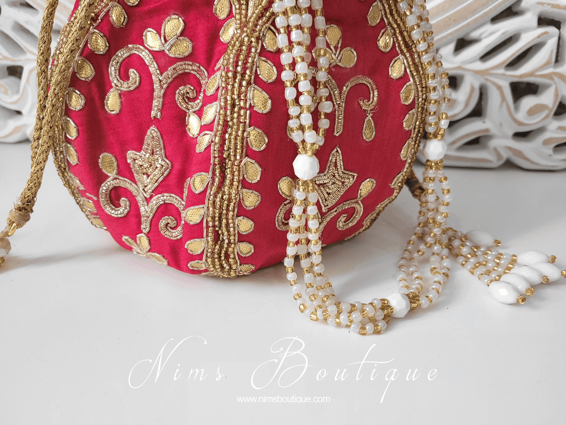 Nims Boutique Bright Red Potli Raw Silk Embellished Bag