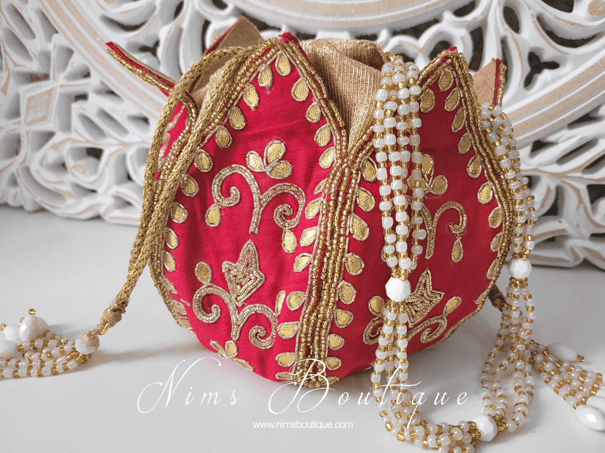 Nims Boutique Bright Red Potli Raw Silk Embellished Bag