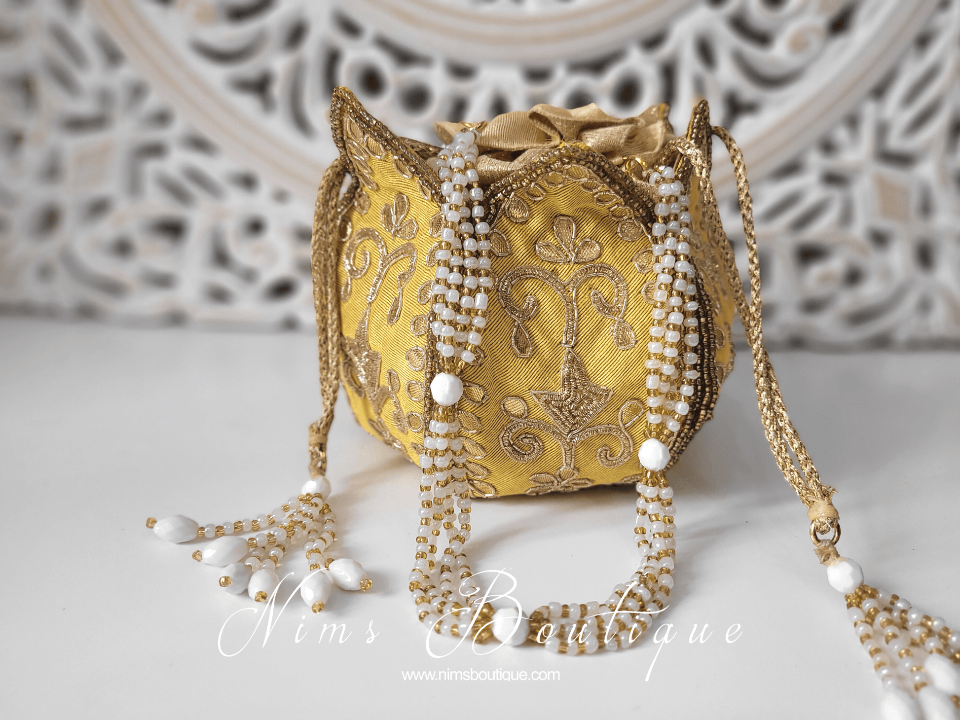 Nims Boutique Light Yellow Potli Raw Silk Embellished Bag