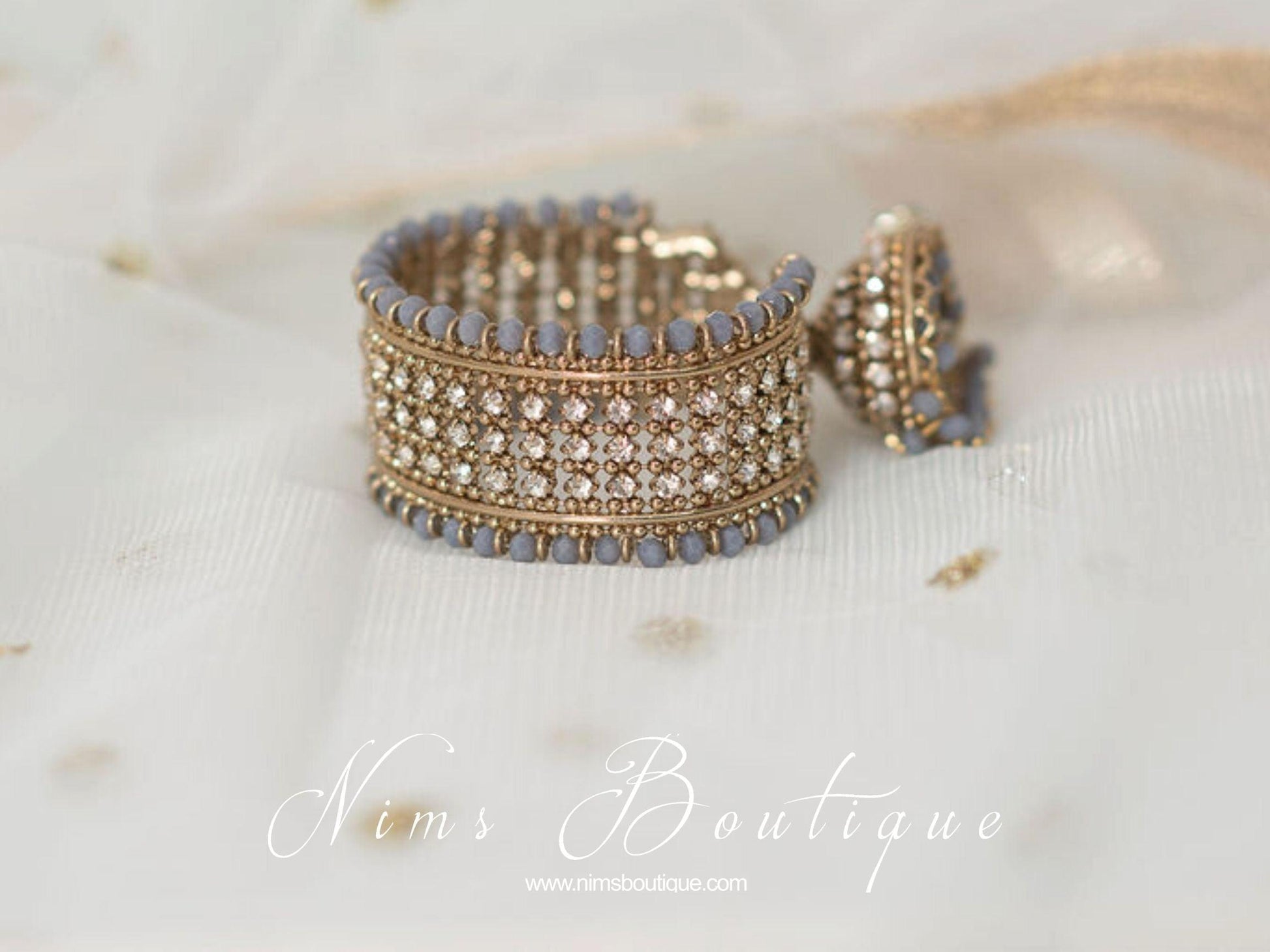 Nims Boutique Royal Grey Bracelet with hanging chumka