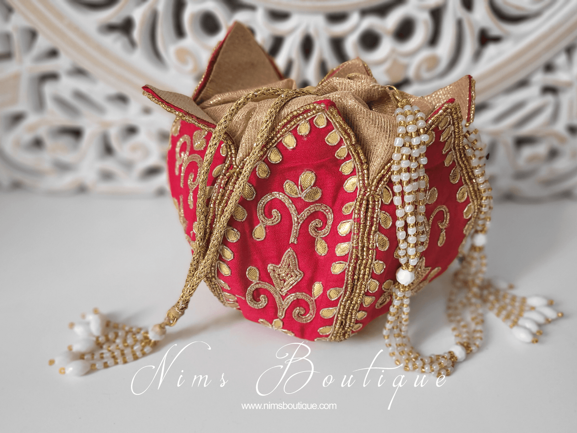 Nims Boutique Bright Red Potli Raw Silk Embellished Bag