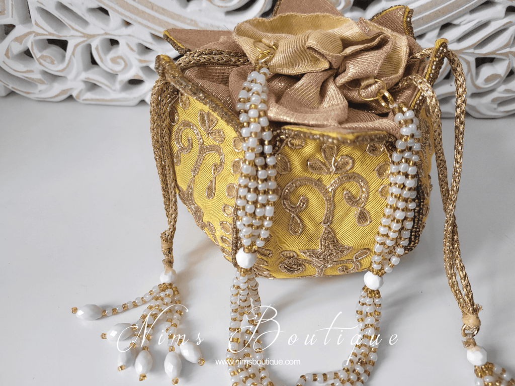 Nims Boutique Light Yellow Potli Raw Silk Embellished Bag