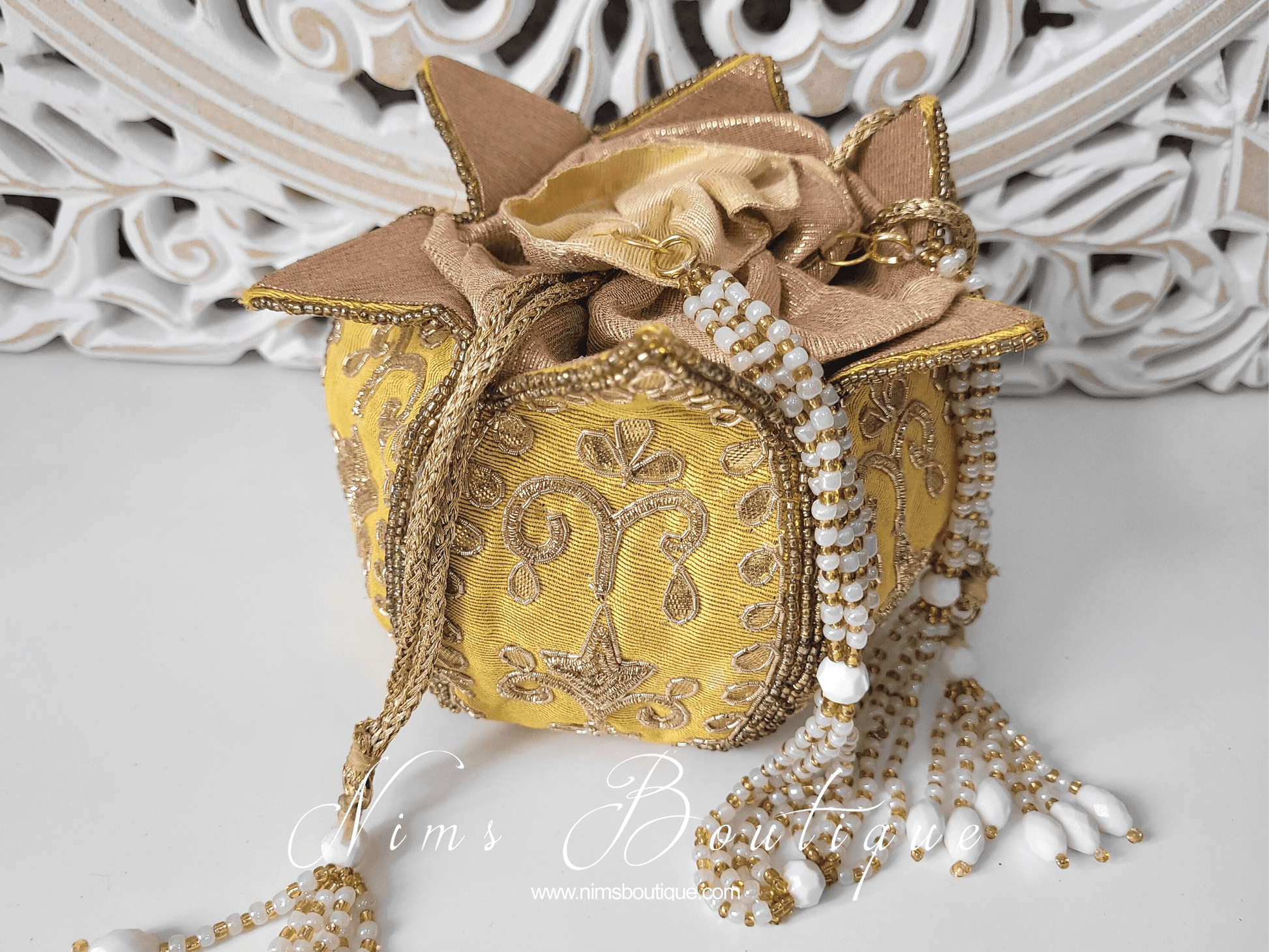 Nims Boutique Light Yellow Potli Raw Silk Embellished Bag