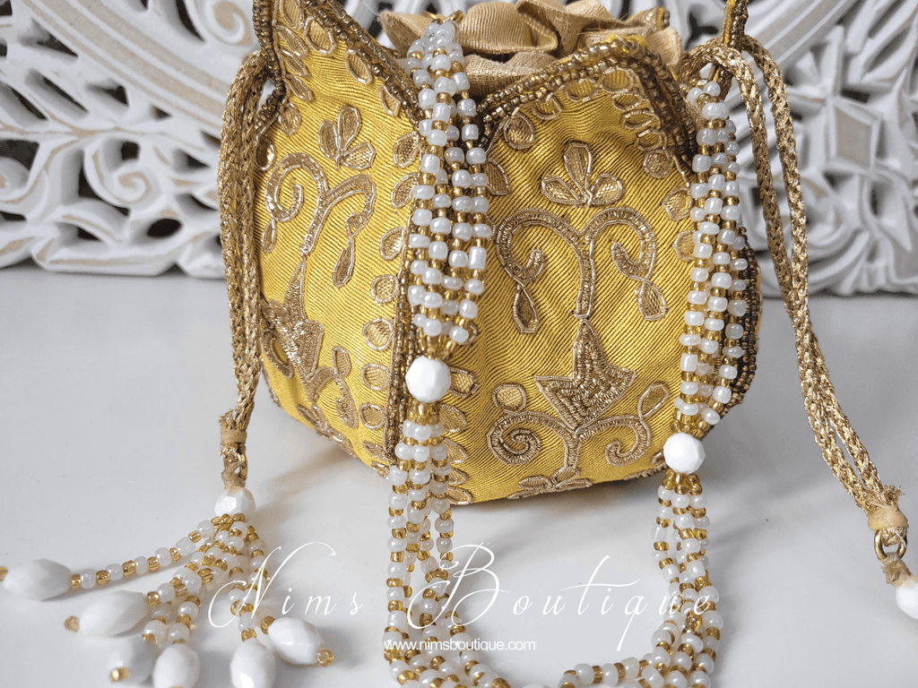 Nims Boutique Light Yellow Potli Raw Silk Embellished Bag