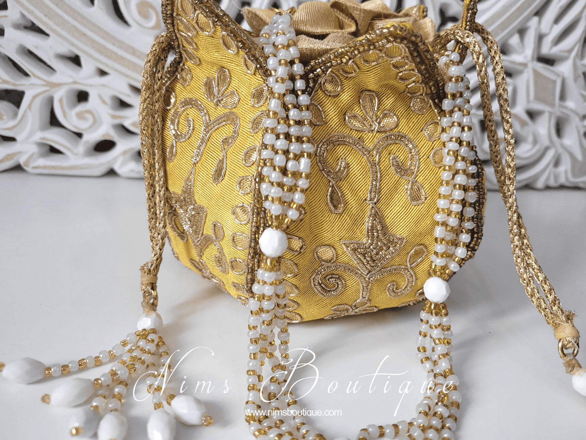 Nims Boutique Light Yellow Potli Raw Silk Embellished Bag