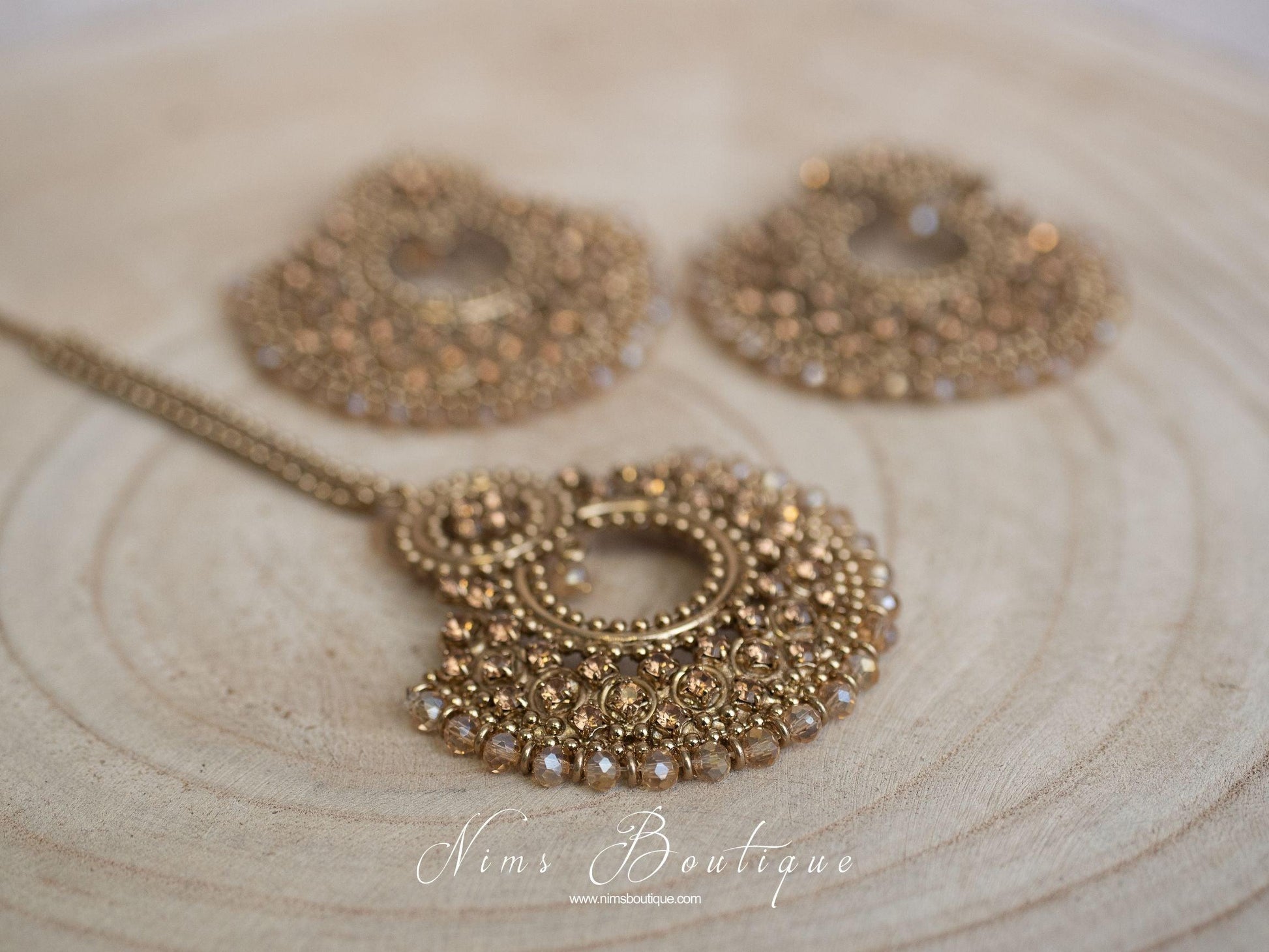 Nims Boutique Royal Gold Stone Chand Tikka Set