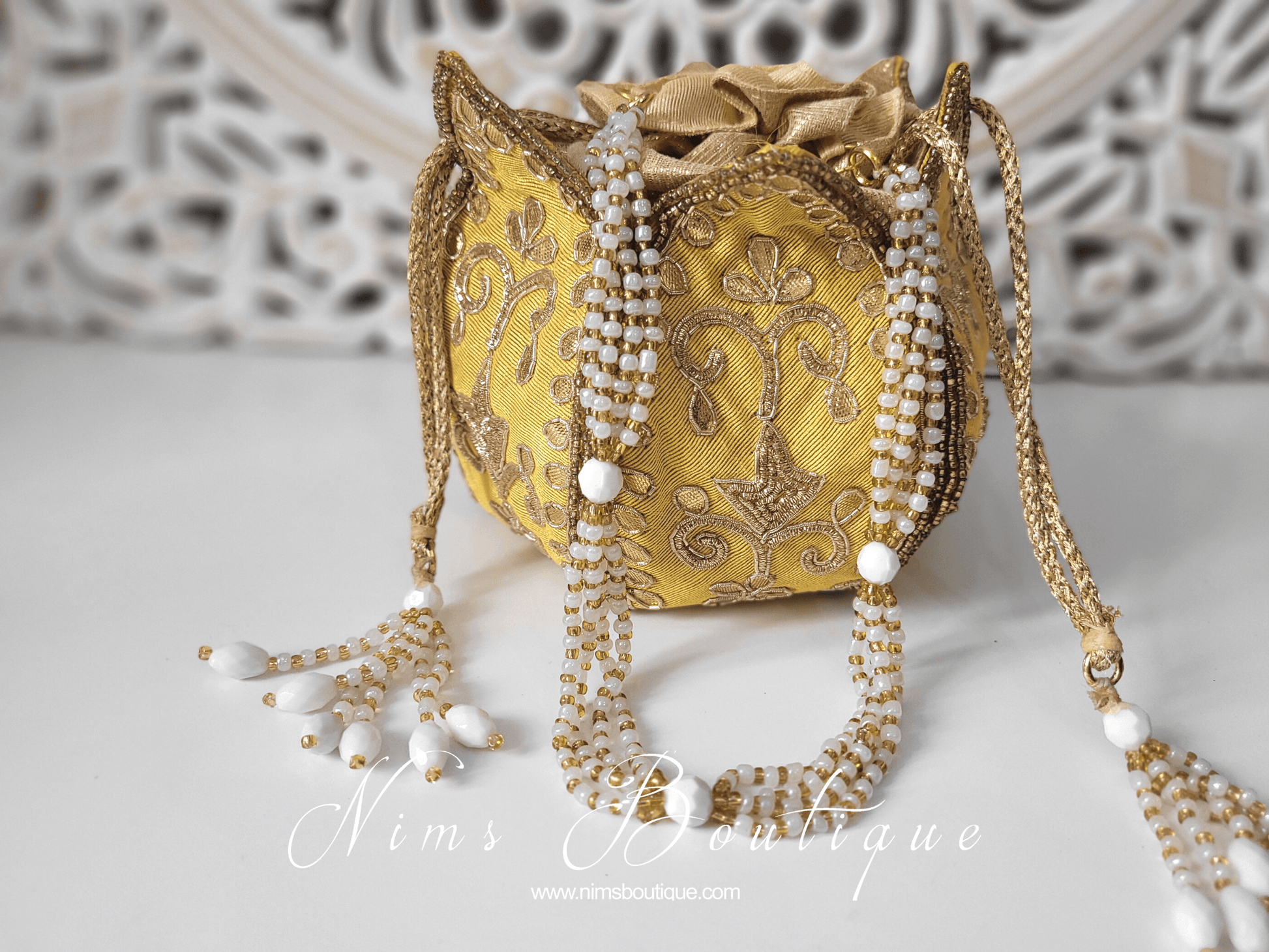 Nims Boutique Light Yellow Potli Raw Silk Embellished Bag