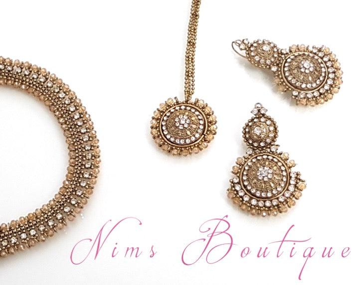 Nims Boutique Royal Gold Tikka & Earrings Set with clear stone